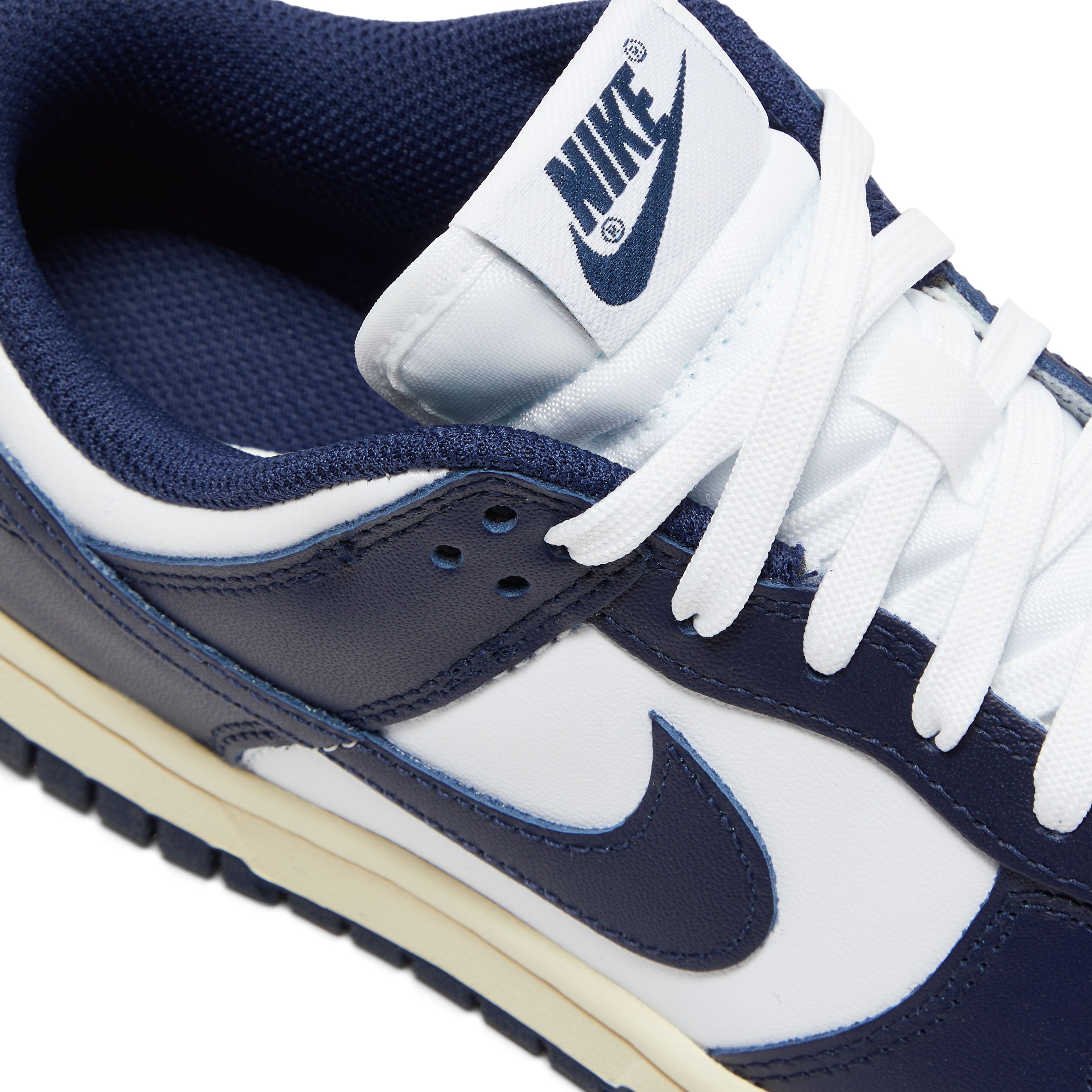 Deals on Women's Dunk Low 'Vintage Navy' on Sneakers.com